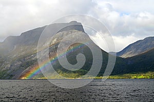Rainbow in fjord landscape norway