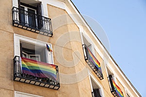 Rainbow flag on the balcony of a house in the Chueca district of Madrid photo