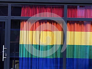 rainbow flag courtain in shop window