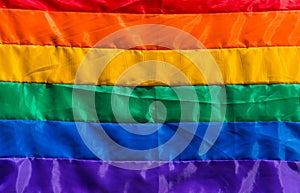 Rainbow flag at a Pride Day gay, lesbian, and LGBT parade. photo