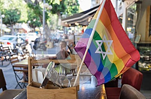 Rainbow flags with the jewish star of David at undefined cafe