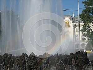 Rainbow within a fountain of water in Vienna