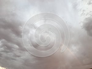 A rainbow in front of clouds 6072