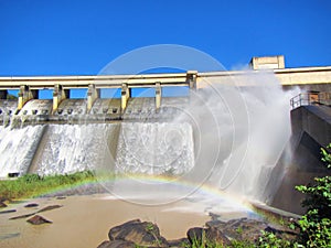 Rainbow in front of a dam wall photo