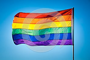 Rainbow Gay Pride Flag on blue sky background, Miami Beach