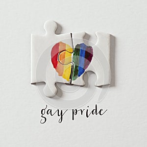 Rainbow heart and text gay pride