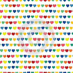 Rainbow hearts hand drawn on a white background. Vector seamless pattern. Blue green orange yellow pink red handmade hearts in a