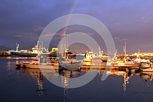 Rainbow in Hofn port, Iceland photo