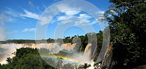 rainbow at iguazu falls photo
