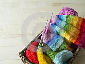 Rainbow knitted hat, handmade. Favorite domestic hobby.