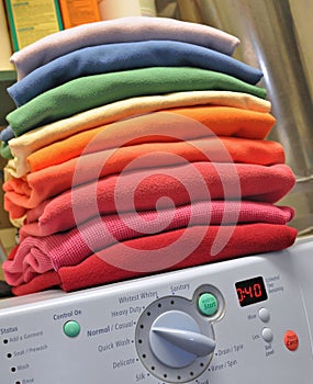 Rainbow laundry on washing machine