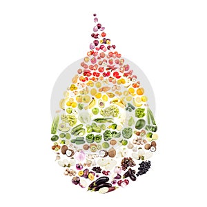 Rainbow made from different raw fruits and vegetables in the drop shape