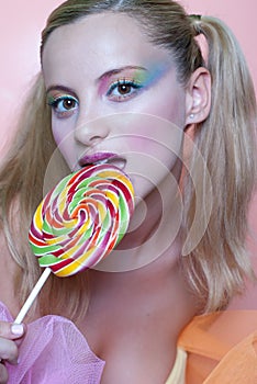 Rainbow makeup and swirl lollipop