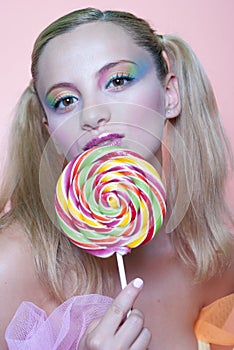 Rainbow makeup and swirl lollipop