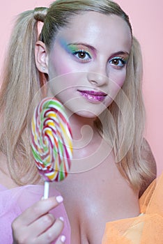 Rainbow makeup and swirl lollipop