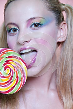 Rainbow makeup and swirl lollipop
