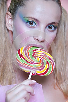 Rainbow makeup and swirl lollipop