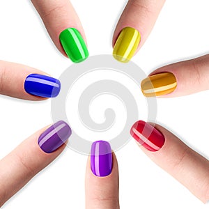 Rainbow manicure, seven color nail polish.