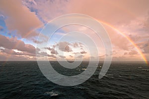 Rainbow in the middle of the sea