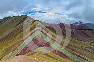 Rainbow mountain of seven colours Siete Colores near Cuzco photo