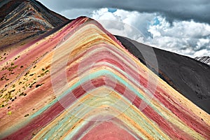 Rainbow Mountain or Vinicunca is a mountain in the Andes of Peru