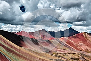 Rainbow Mountain or Vinicunca is a mountain in the Andes of Peru