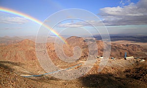 Rainbow and mountains photo