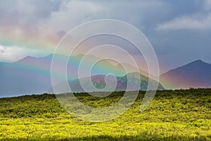 Rainbow in mountains