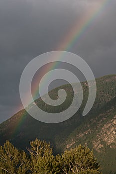 Rainbow in the mountains in the valley Chulyshman. Altai.Russia.Sibir