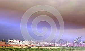 Rainbow multi color image in blue sky rain nature.