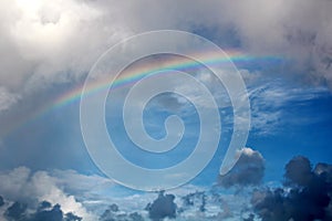 Rainbow in the ocean after rain and thunderstorms.