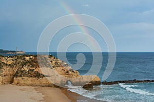 Rainbow over the Atlantic Ocean. Portimao, Algarve, Portugal