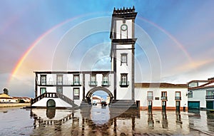 Rainbow over Azores - The town of Ribeira Grande, Sao Miguel Island, Portugal photo