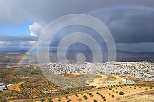 Rainbow over Cana of Galilee after rain, Israel