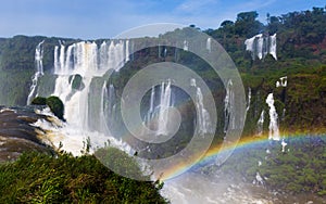 Rainbow over Cataratas del Iguazu waterfall, Brazil