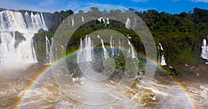 Rainbow over Cataratas del Iguazu waterfall, Brazil