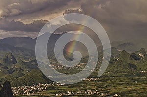 Rainbow over the city of Xing Ping after a torrential rain with strong wind and hail.