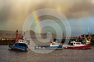 Rainbow over fishing boats at Lyme Regis