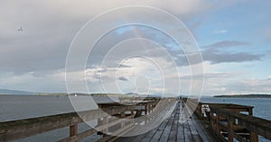 Rainbow over fishing pier