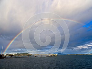 Rainbow over fishing pier in Sidney