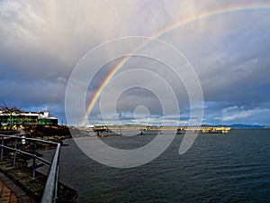 Rainbow over fishing pier in Sidney