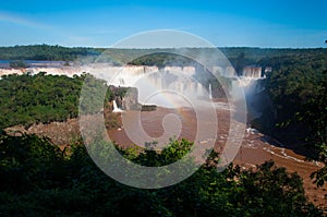 Rainbow over gorgeous waterfalls of Iguazu, Brazil