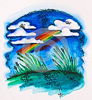 Rainbow over green meadow