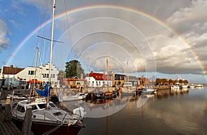 Rainbow over harbor in Zoutkamp, Groningen