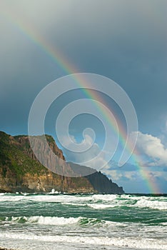 Rainbow over headland