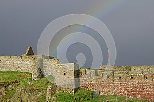 Rainbow over historical castle