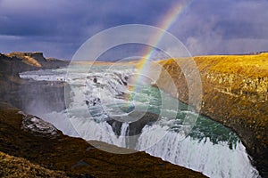 Rainbow Over Icelandic Waterfall