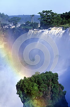 Rainbow over Iguazu Waterfalls in Parque Nacional Iguazu viewed from Upper Circuit, border of Brazil and Argentina
