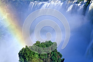 Rainbow over Iguazu Waterfalls in Parque Nacional Iguazu viewed from Upper Circuit, border of Brazil and Argentina