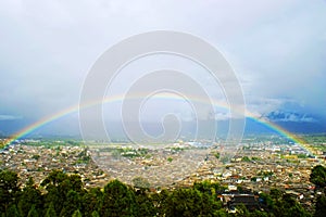 Rainbow over the Lijiang old town photo